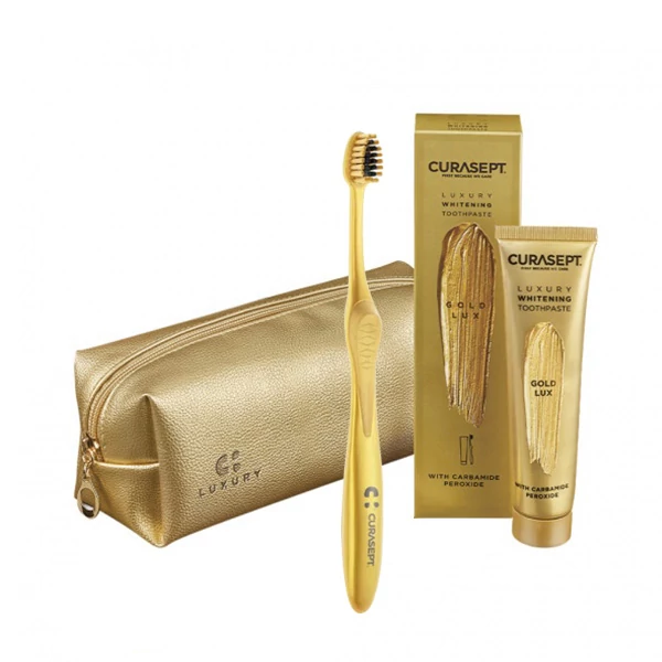 Набор Curasept Gold Luxury Whitening (зубная паста 75 мл. + зубная щетка + косметичка) ЕС